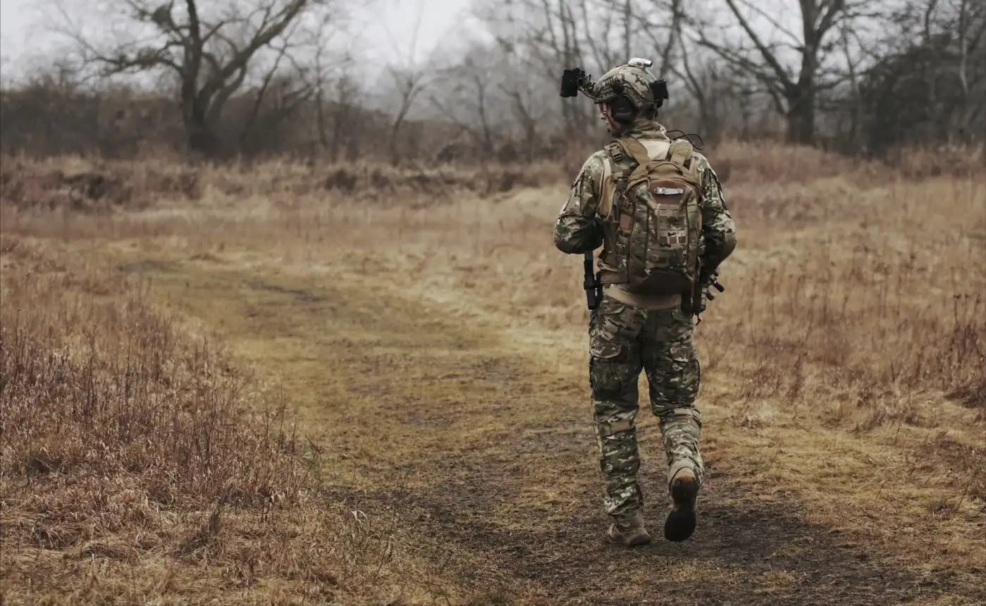 Soldier walking in the field